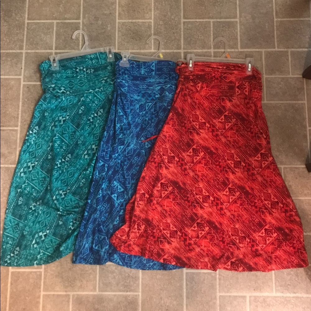 SOLD! MAXI, A STRAPLESS/HALTER DRESS ALL  $33.00